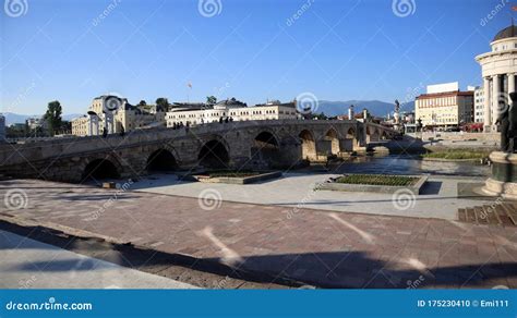 Stone Bridge Over River Vardar In Downtown Of Skopje Near