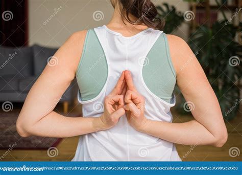 Close Up Of A Woman S Hands Yoga Behind Her Back With Folded Stock