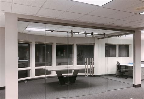 incorporating glass sliding doors in glass partition wall — delta glass nj