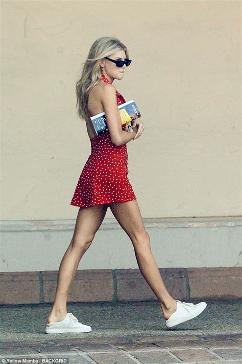 Charlotte Mckinney Shows Off Her Long Legs In Thigh Skimming Red Polka