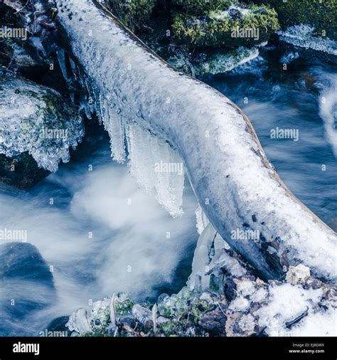 Frozen Icicles On Water Flow Stock Photo Alamy