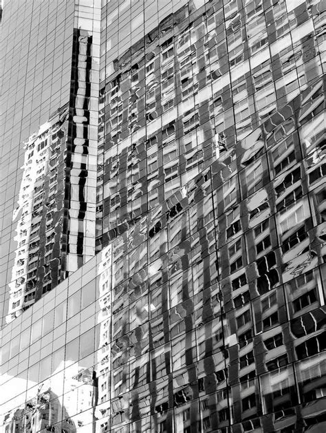 Amazing View Of A Downtown Building Covered With Glass Stock Photo