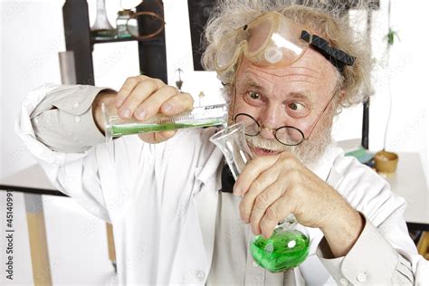 Mad Scientist Conducts Chemistry Experiment In His Lab Stock Photo