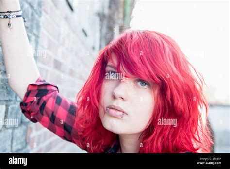Close Up Punk Teenage Girl Piercings Dyed Hair Stock Photo Alamy