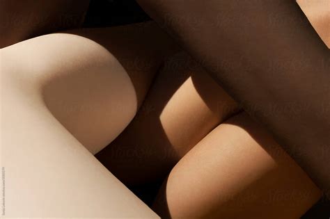 Mixed Skin Color Legs Crossed By Stocksy Contributor Sonja Lekovic Stocksy