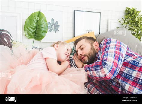 Father And Daughter Sleeping Together In Bed Stock Photo Alamy