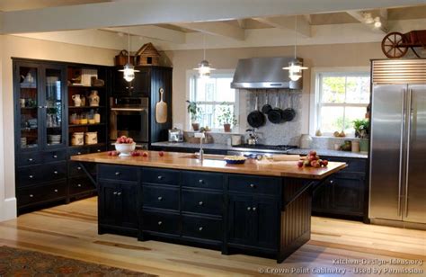 Pictured here is a modern kitchen employing gleaming black countertop and backsplash. Pictures of Kitchens - Traditional - Black Kitchen Cabinets