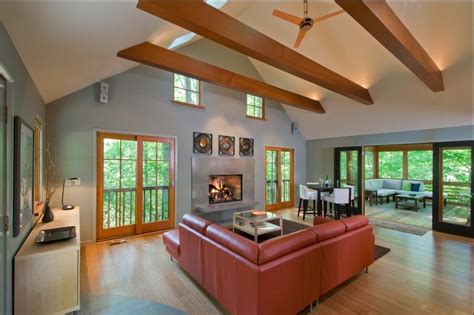 If you can weave your lighting between them, all the better. Exposed beam ceiling lighting living room contemporary ...