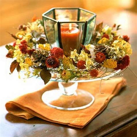 The arrangement is made of silk. 25 Fall Flower Arrangements, Thanksgiving Table ...