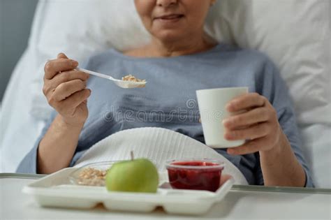 Patient Eating Lunch In Hospital Ward Stock Photo Image Of Indoors