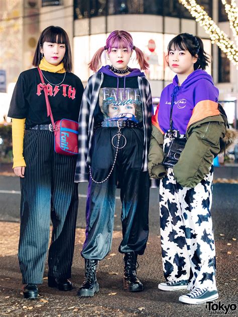 Japanese Students Showcasing Layered Street Fashion In Harajuku Tokyo