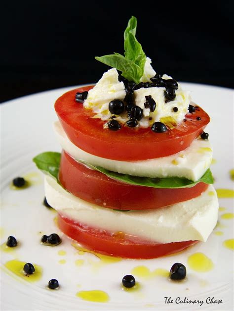 Tomato And Mozzarella Stack With Balsamic Pearls The