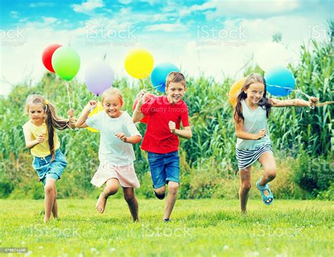 Children Playing With Colorful Balloons Stock Photo ...