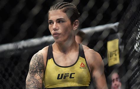 Brazilian fighter jessica andrade celebrates her victory against us fighter rose namajunas during their women's strawweight. Jessica Andrade Demolished Karolina Kowalkiewicz Via First ...