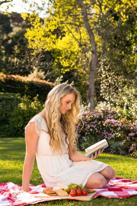 Beautiful Blonde Having A Picnic While Reading Stock Image Image Of