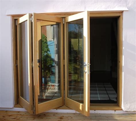 How to prevent a sliding glass from drafting? Folding Doors WE OPEN THE DOORS FOR PROGRESS. 2 lock ...
