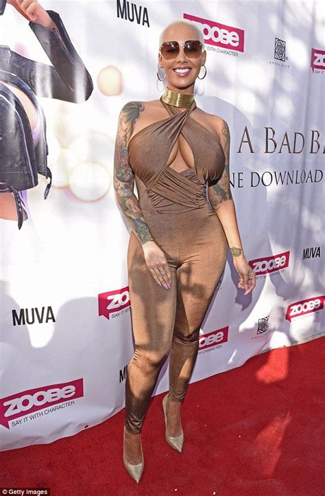 Amber Rose Flaunts Her Ample Cleavage And Famous Curves In Skintight