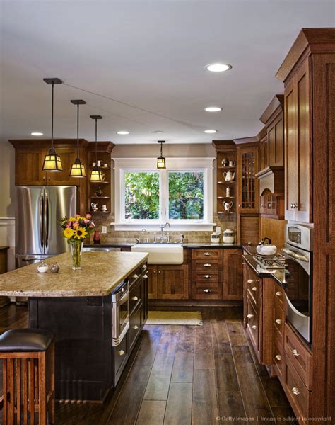 Going into 2021, wood stained kitchen cabinets will still be popular in more traditional kitchens. Image detail for -Hardwood floors and cabinets in kitchen ...