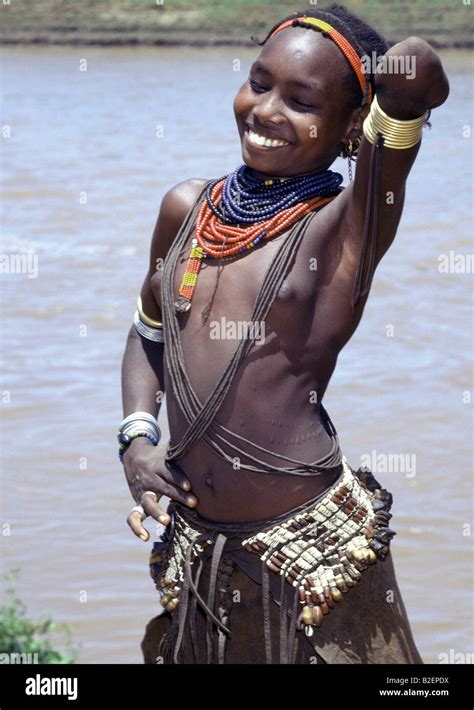 A Young Dassanech Girl Beside The Omo River Her Hairstyle Necklaces