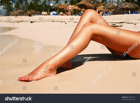 Women S Sexy Legs On The Beach Stock Photo 48695575 Shutterstock