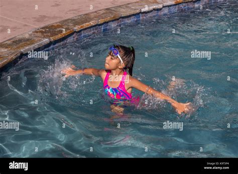 1 One Hispanic Girl Playing In Swimming Pool Swimming Pool Freshwater Swimming Pool Castro