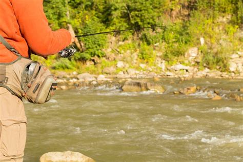 A Young Man Fishing In A Mountain River Stock Image Image Of Natural