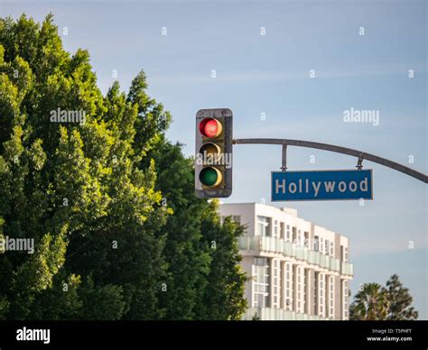 Hollywood Blvd Street Sign On Traffic Light At Intersection At Los