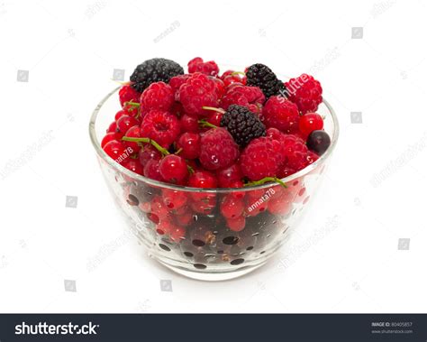 Assort Of Fresh Berries In Glass Bowl Over White Stock Photo 80405857