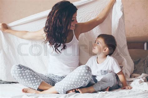 Mom Relaxing With Her Little Son Stock Image Colourbox