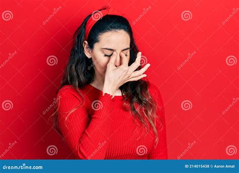 Young Hispanic Woman Wearing Casual Clothes Tired Rubbing Nose And Eyes Feeling Fatigue And
