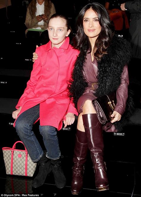 Salma Hayek Attends Milan Fashion Week In Plum Skirt Suit And Co Ordinating Knee High Boots