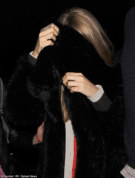 Cara Delevingne Comes Over Unusually Camera Shy After Proposal