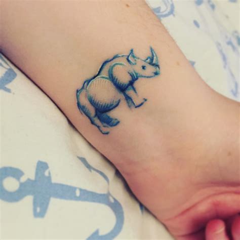 Small Rhino On The Wrist 1yr Old Here Still As Vibrant 2yrs Down The