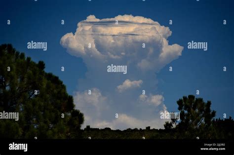 Towering Cumulonimbus Clouds Form On The Horizon In New Mexico Near
