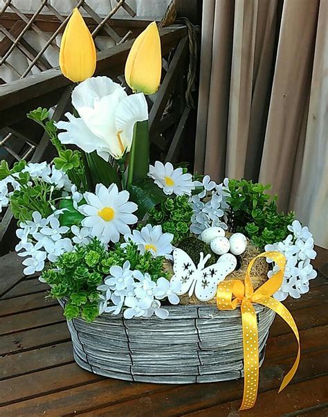 Easter And Spring Decorations A Box Of White And Yellow Flowers