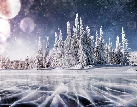 Blue Ice And Cracks On The Surface Of The Ice Frozen Lake In Winter