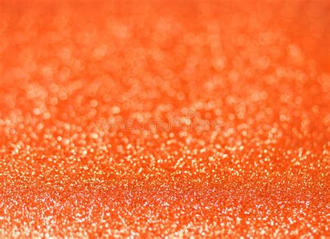 Orange Glitter Shiny Texture Background For Christmas Celebration