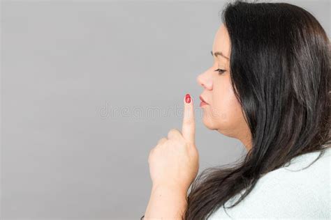Woman Asking For Silence With Finger On Lips Stock Photo Image Of