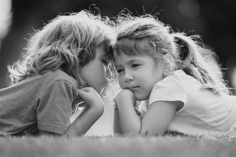 Premium Photo Little Boy And Girl In Love Cheerful Kids Playing On
