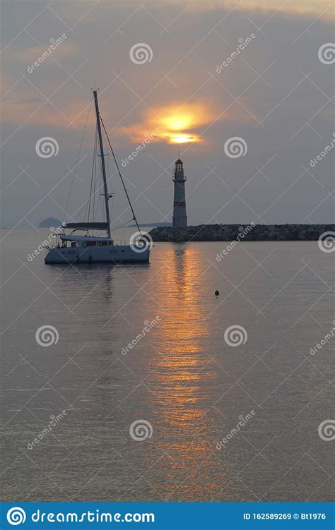Seascape At Sunset Lighthouse On The Coast Stock Image Image Of
