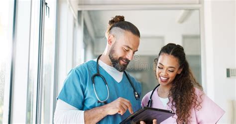 Medical Nurse Surgeon And Healthcare Tablet With A Team Talking