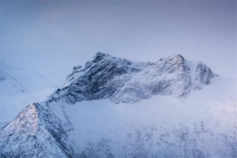 Snowy Mountain Peak With Light In Foggy Stock Photo Image Of Peak