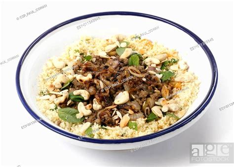 Tagine Of Moroccan Spiced Mince And Couscous Stock Photo Picture And