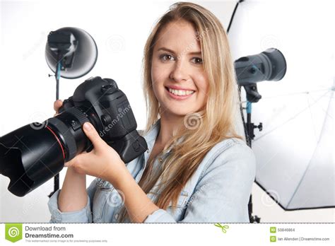 Female Professional Photographer Working In Studio Stock Photo - Image of portrait, people: 50846864