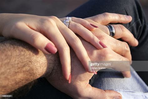Husband And Wife Holding Hands Showing Rings Photo Getty Images