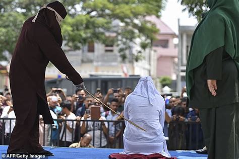 Indonesias Aceh Whips Unmarried Couples After Hotel Raid