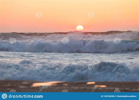 Sunset Over The Ocean Panorama Of Ocean Waves And Setting Sun Stock