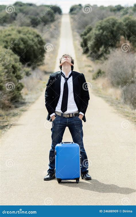Man In Lonely Road With Suitcase Stock Image Image Of Handsome