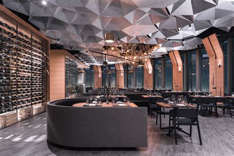 Hexagonally Shaped Ceiling Coffers Help Dampen Sound In