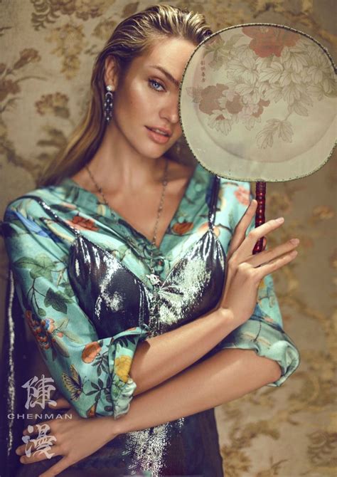 Posing With A Fan Candice Swanepoel Wears A Metallic Slip Dress
